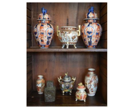 Group of Japanese ceramics to include; a pair of Imari pattern lobed ovoid jars and covers, each with dog of Fo finial, a Sat