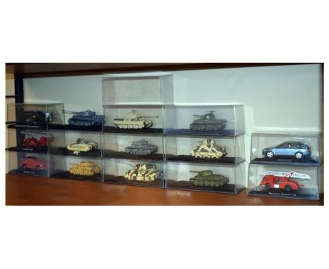 Fourteen various scale model tanks, fire engines, etc   Condition: 