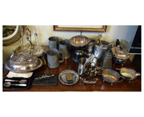 Selection of metal wares to include; silver plated Art Deco three piece tea service, pewter mugs, hammered hip flasks, liqueu