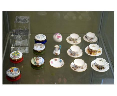 Three Crumles enamel boxes, two similar Harrods boxes, together with six Caverswall miniature cups and saucers etc Condition: