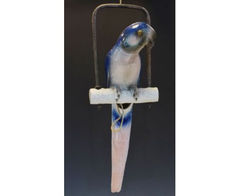 Early 20th Century Continental ceramic figural hanging lamp formed as a parrot perched on a branch, overall height including 