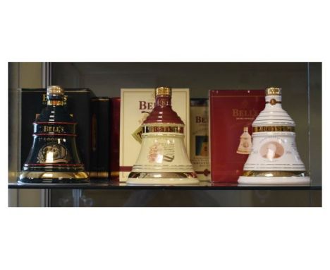 Scotch Whisky - Six Bell's Christmas Decanters, each containing 70cl Extra Special, aged 8 years whisky, 1994, 1995, 1996, 19