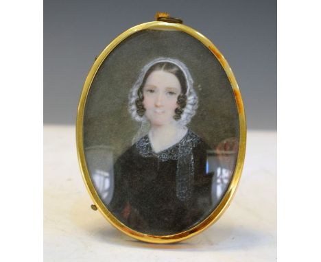 19th Century English School - Oval miniature - Portrait of a lady wearing a lace cap   Condition: 