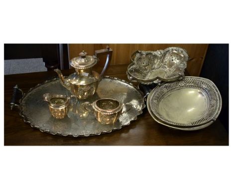Small group of plated wares comprising: three piece EP on copper tea service, wavy edged oval tray with ebonised turned handl
