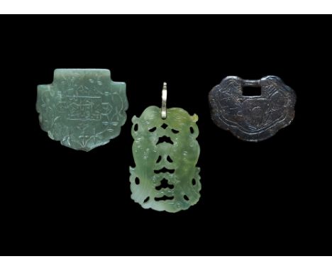 19th-20th century AD. A mixed group of carved plaques comprising: an olive green jade D-shaped panel with foliage and tendril
