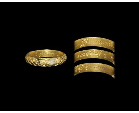 18th century AD. A D-shaped hoop with raised seriffed chevrons representing a wreath to the outer face, with traces of black 