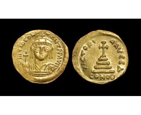 578-582 AD. Constantinople mint. Obv: DM TIB CONSTANT PP AVI legend with crowned and cuirassed bust facing, holding cross on 