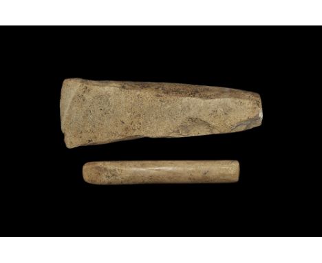 Neolithic, 5th-3rd millennium BC. Group comprising: a knapped and polished axe with squared sides and butt, tapering to a con