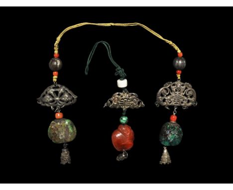 19th-20th century AD. A mixed group comprising: a carved carnelian monkey plaque with dangle attached to a spherical turquois