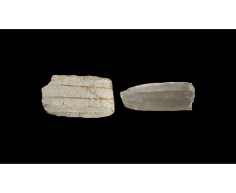 Neolithic, 5th-3rd millennium BC. A mixed pair of knapped chert blades. 434 grams total, 12cm (4 3/4"). Ex Dr M. G. Weller co