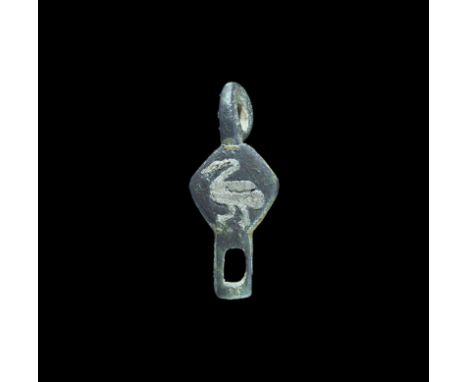 14th century AD. A bronze harness fitting with a diamond shaped body and attached suspension ring above, below the body is a 