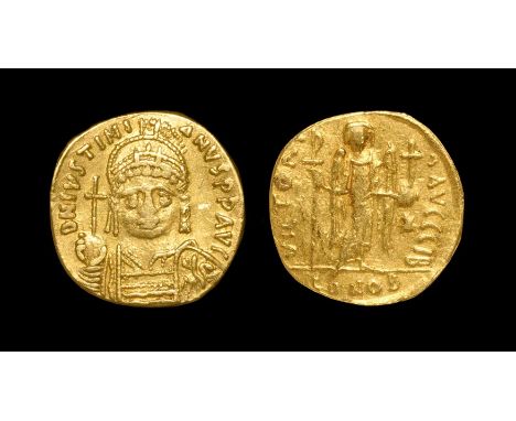 527-538 AD. Constantinople mint. Obv: D N IVSTINI-ANVS P P AVG legend with helmeted and cuirassed bust facing, holding cross 