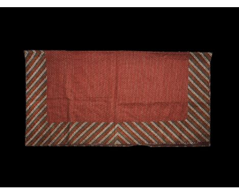 Early 20th century AD. A red silk floral-patterned panel on a fabric backing. 330 grams, 108 x 116cm (42 1/2 x 45 1/2"). Prop