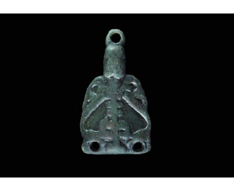 11th century AD. A bronze stirrup mount of Williams's Class A Type 6 comprising a D-shaped plaque with high-relief central tr