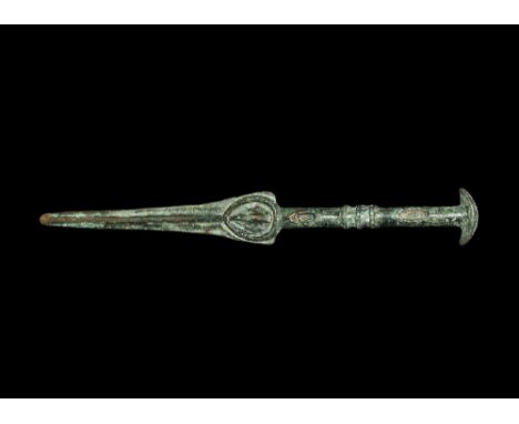 13th-6th century BC. A bronze dagger with leaf-shaped blade, round-section hilt and scaphoid pommel; three raised ribs to the
