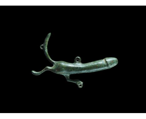 1st-2nd century AD. A bronze phallic pendant with running legs and raised tail, loop to tail and back. 58 grams, 87mm (3 1/2"
