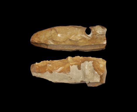 Neolithic, 5th-2nd millennium BC. A large livre de beurre flint core with cortex and inclusions, natural void; evidence of tw