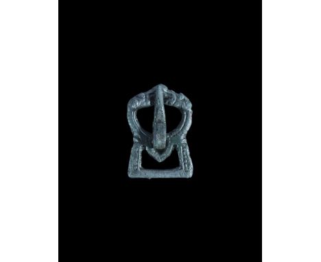 9th-10th century AD. A bronze buckle with loop formed as opposed beast-heads, rectangular openwork plaque to the rear, triang