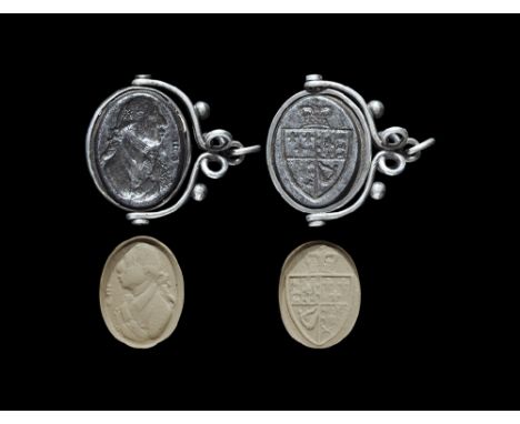 18th century AD. A fob seal with silver wire frame and suspension loop, the oval double-sided cut steel seal mounted in silve