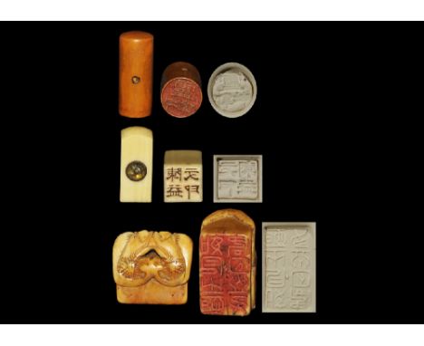 19th century AD. A mixed group comprising: a square-section ivory chop seal with domed top and a small magnetic compass set i