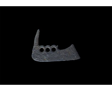 10th-12th century AD. A triangular-section iron plaque with spike to one long edge and three loops. 37 grams, 63mm (2 1/2"). 