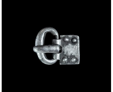 5th century AD. A silver buckle assemblage comprising a round-section loop and rectangular plaque with strap to the reverse a