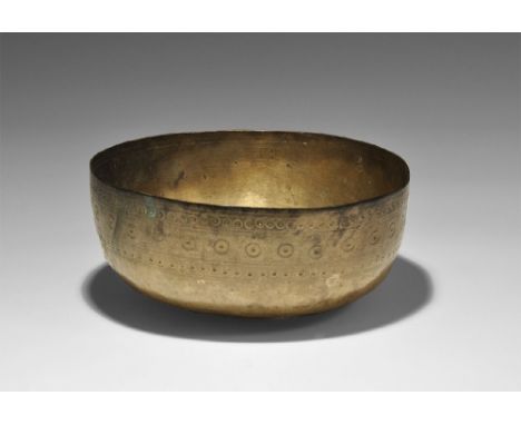 1st century BC-2nd century AD. A sheet silver hemispherical bowl with incised concentric lines to the inner face with ring-an