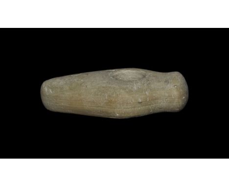 Neolithic, 5th-2nd millennium BC. A very well formed ceremonial axe-hammer in a fine-grained pale brown serpentine material s