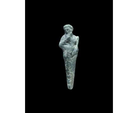 6th-5th century BC. A bronze figure of Herakles with head tilted, right hand gripping the beard, left hand cradling a sceptre