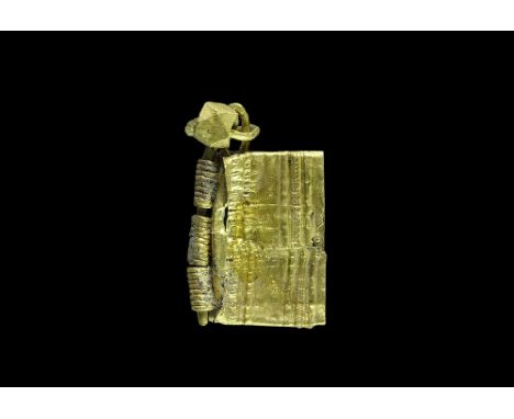 13th century AD. A pendant formed as a miniature bible or book (St. Mark) with two rectangular pages, rectilinear hatched gri