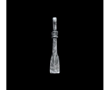 6th-7th century AD. A pair of silver tweezers with shovel-shaped jaws, applied wire coil to the shank. 7.15 grams, 52mm (2").