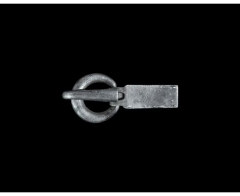 5th century AD. A silver buckle assemblage comprising a round-section loop and rectangular plaque with strap to the reverse a
