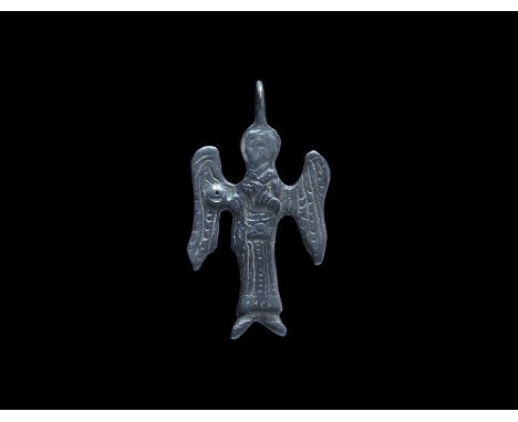 9th-12th century AD. A flat-section plaque with integral suspension loop, winged and nimbate figure in a long robe with orb i