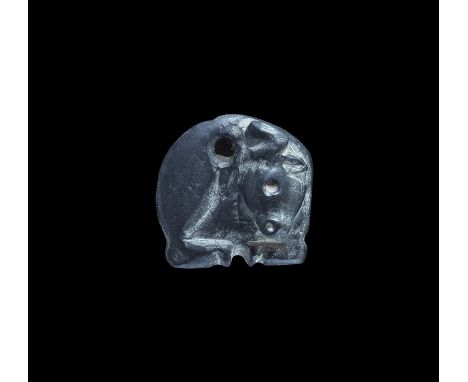 4th millennium BC. A carved hard shale seal matrix of a bull with head modelled in the half-round, pierced at the neck; drill