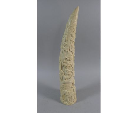 A Resin Model of a Carved Elephant Tusk, Decorated in Relief with Animals and Birds, 41cm High 
