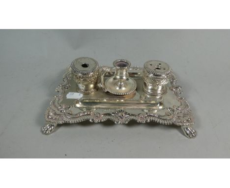 A Silver Plated Inkstand with Two Inkwells and Central Candle Stick, 21cm Wide 