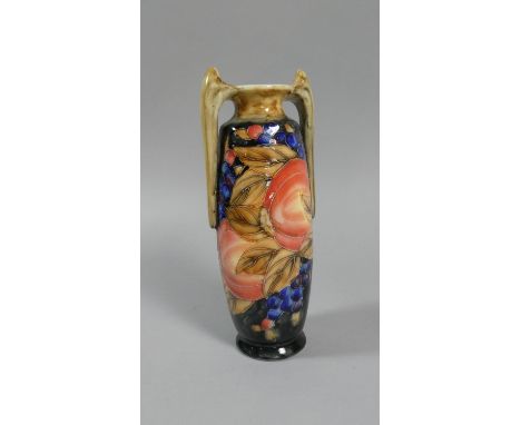 A Glazed Two Handled Ceramic Vase, 22cm high 