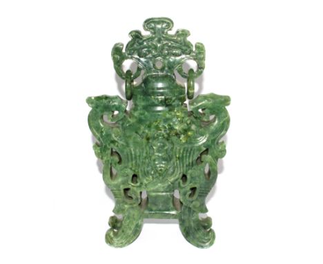 A large jade vase and cover with ring handle on four feet, 30cm high