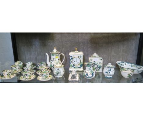 Mason's Ironstone Chartreuse pattern table clock, coffee pot, eight coffee cans and saucers, tea caddy, and other matching wa