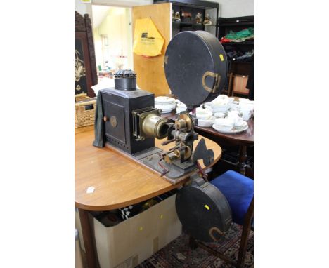 An early 20th century blacked tin magic lantern with 35mm film projector, possibly by J.A. Prestwich of Tottenham, c.1910 72c