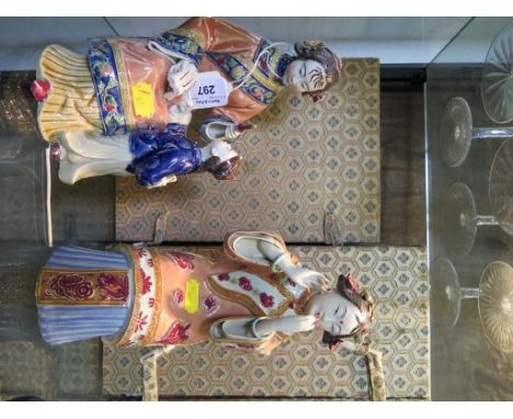 A Chinese ceramic figure of a seated mother teaching a boy calligraphy, with a fitted case, 22cm high and a Chinese ceramic f