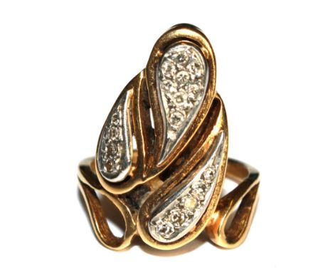 An 18 carat gold dress ring with diamond set leaves