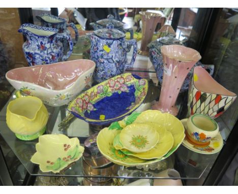 Two Clarice Cliff Crocus pattern coffee saucers and a jam pot (lacking lid), a Maling ware floral pattern teapot, coffee pot 