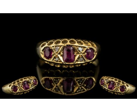 18ct Gold Antique Ruby &amp; Diamond Ring, set with three rubies between diamond set spacers, fully hallmarked for Birmingham