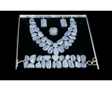 A Stunning Parure of Delicate Blue Lace Agate Cabochon Cut Polished Stones Set In Sterling Silver - The Set Consists of a bea