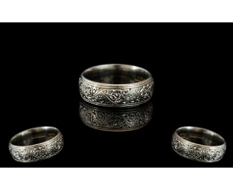 Platinum Ladies Small Size Wedding Band, marked platinum to interior of shank.  Maker's mark W. W. Ltd.  Weight 6.2 grams.  R