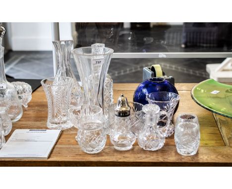 Collection of Quality Crystal Glass Items, comprising a 10'' cut glass decanter, a 10'' vase, an 11'' crystal water jug, a 6'