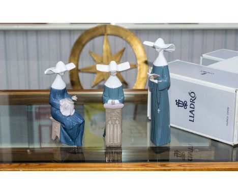 Lladro Religious Figures. ( 3 ) In Total. Comprises 1/ Lladro Nun, ' Time to Sew, With Box and Certificate. N0 05501. 2/ Llad