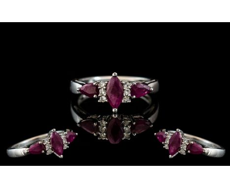 Ladies 9ct Gold Attractive Ruby and Diamond Set Ring. Full Hallmark to Interior of Shank. The Rubies and Diamonds of Excellen
