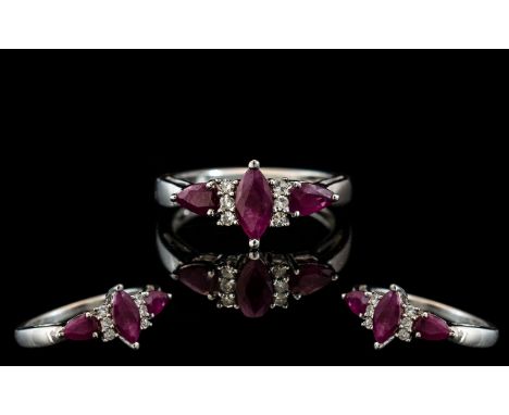 Ladies 9ct Gold Attractive Ruby and Diamond Set Ring. Full Hallmark to Interior of Shank. The Rubies and Diamonds of Excellen